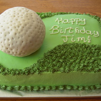 Golf Birthday Cake Key lime cake and key lime buttercream frosting with fondant covered cake golf ball and fondant "green".