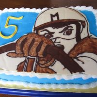 Speed Racer Chocolate this is a chocolate cake with vanilla buttercream icing. The speed racer image on the top i made out of white, milk and dark chocolate.