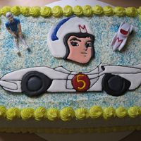 Speed Racer Cake color flow speed racer and mach 5, whipped icing on rest of cake