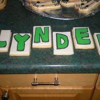 Letter Cookies I iced out the letters to my sons name on homemade MMF using Antonia74 icing. These were put onto cupakes for my son's 12th birthday...