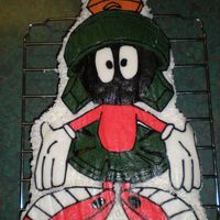 Marvin The Martian My first attempt at doing a buttercream transfer onto a character cake molded cake. I am very happy with how it turned out even though its...