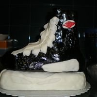 Hockey Skate For 12Th Birthday I molded this skate out of Rice Krispies and covered it in homemade fondant. The recipe for fondant was found on cakejournal.com. It is the...