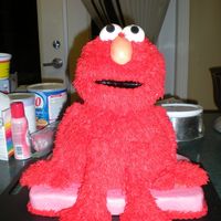 Dscn1416.jpg This is my first attempt at a 3D sculpted cake. I made this yesterday for my beautiful little girl who adores Elmo and was turning 1 today...