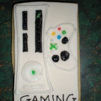 Xbox Cookie I drew this pcicture freehand onto a piece of homemade MMF. Used Antonia74 icing to outline and fill in the picture. This was one of the...