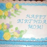 Flowers For My Mom I made this cake for my moms birthday. Its a two layer cake.. Chocolate on bottom, yellow on top. She and everyone loved it.. TFL!