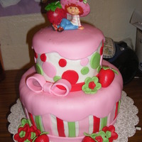 Strawberry Shortcake My daughter wanted a Strawberry Shortcake cake for her birthday, so this is what I made for her :) TFL