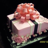 Pink And Black With Big Bow 10" Sq. white cake, pink icing, black and white strips, big bow on top