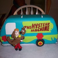 Scooby Doo Mystery Machine Cake Carved cake, chocolate cake w/ buttercream icing as filling. Scooby & Shaggy made of fondant (used guide in Debbie Brown's book -...