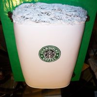 Starbucks Coffee 11x15 sheetcake carved & covered in fondant. Logo piped with royal icing. Coffee beans made of fondant.