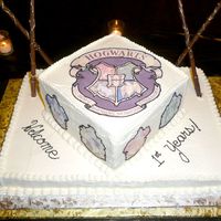 Hogwarts Cake A Harry Potter Party! The guests were encouraged to dress up and had a chance to "earn their wands" during the games! The emblems...
