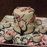 Cherry Blossom Cake choc cake with peppermint choc ganache, covered in fondan,with royal icing piped and fondant cherry blossoms