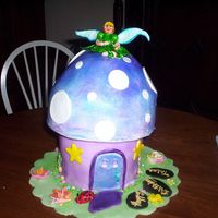 Fairy Cake Made for a birthday. This cake is made with gumpast and fondant.