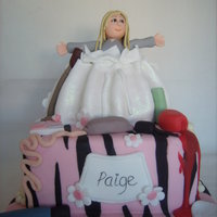 Teenager This was designed by the recipient, bottom is chocolate cake with vanilla filling and the bag on top is lemon cake with lemon curd filling....