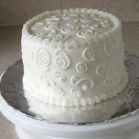 Sms This is a 6" wasc with buttercream & strawberry filling that I made for the secretariesoffice at my local middleschool