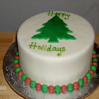 Holidaytreefondant.jpg dummy cake covered with fondant; fondant christmas tree