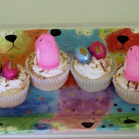 Nesting Chicks & Eggs Banana cuppies filled with chocolate truffle filling; coconut nests and peanut butter eggs and peep chicks