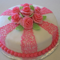 Pink Fondand Roses first time making fondant roses. Those are a lot of work!