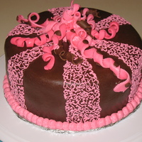 Pink And Brown My inspiration for this cake was one of my daughter's hair bows. First time covering a cake in fondant. I had a lot of trouble with...