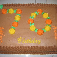 70Th Birthday Yellow cake with Choc BC, Roses are candy melts (I stink at BC roses), Thanks to "thephotolady" for design inspiration