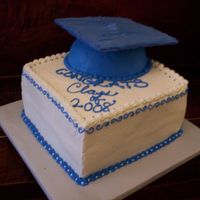 Graduation Cake the cap is a piece of cardboard covered in tinted white chocolate candy melts )I didn't have any fondant on hand)' I also used a...