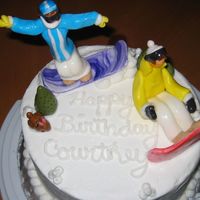 Snowboarder Figure Cake fondant figures snowboarders with bunny and pine trees . snowball decorations