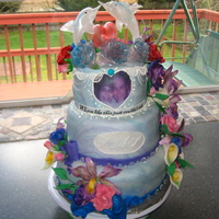 Dolphin Wedding Cake This cake is 3 tiers, the bottom tier is butter white cake alternated with marble (butter white and hershey's chocolate cake) the...