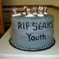 Over The Hill three layer orange cake iced in almond BBC. Tombstones are mini 3 muskateersbars. TFL