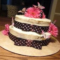 Bridal Shower Bottom layer is banana nut cake and the top layer is almond cake. Iced in cream cheese icing. Fabric bow, artificial flowers and fabric...
