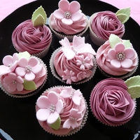 Pink Delights Vanilla Cupcakes with raspberry icing and dark chocolate cupcakes with wildberries icing