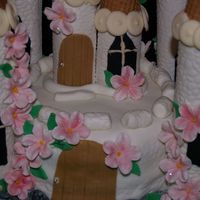 Close Up Of Flowers FLOWERS ON CASTLE CAKE