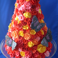 Rose Tower Cherry-chocolate chip cake with almond buttercream, MMF ribbon roses, and chocolate butterflies for my daughter's birthday tea party....