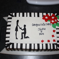 Engangement Cake Half Chocolate, Half Yellow filled with buttercream. All buttercream with fondant accents