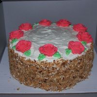 Mother's Day Cake This was for my mother on mother's day. She loves Italian Creme, so it's frosted with cream cheese icing and then toasted...