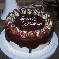 Chocolate Covered Strawberry This was for a going away party. White cake w/strawberry filling. BC with chocolate ganache, topped with chocolate covered strawberrries.