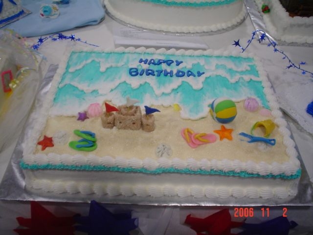 Beach Birthday All edible sculpted from fondant.