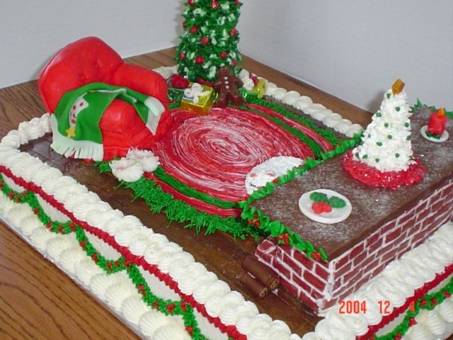 Christmas At Home Everything is edible. The chair is pound cake, the cat is royal icing, the fireplace is sugar wafers, chocolate, fondant and buttercream.