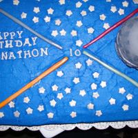 Star Wars half chocolate half white wasc cake, buttercream icing, fondant stars, light sabers and letters