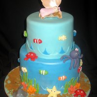 Under The Sea Baby Shower Fondant sea creatures and baby girl in a gumpaste shell.