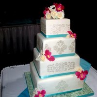 Shimmery Damask Wedding Fondant bamboo on board, gumpaste flowers to match the brides bouquet, shimmer airbrush stencil.