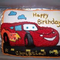 Lighting Mcqueen Made this for my grandson. I am getting a little better as I go. I did the road, eyes, clouds and blue windows in fondant. The rest was...