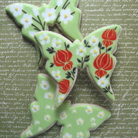 Butterflies! Butterfly Cookie Trio Designed and photographed for the August issue of Cake Central Magazine. Top and bottom cookies are piped wet on wet flowers with overpiped...