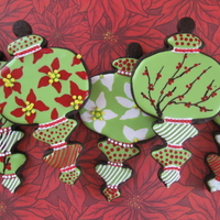 Christmas Ornament Cookies I am getting started early this year on Christmas cookies! Poinsettas and berry branches were done wet one wet as were most of the dots....