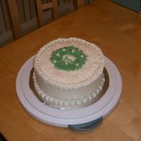 Christmas Wreath Orange cake covered and decorated in butter cream.