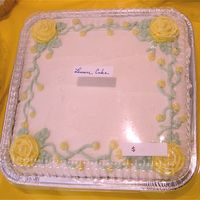 Simple Roses I was just having fun for a bake sale. This is a lemon cake covered in lemon bc with royal icing roses.