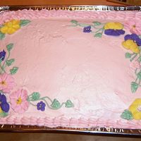 Flowers A simple lemon cake that I pieced together for a bake sale using royal icing flowers that I had on hand.