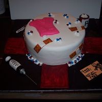 Prison/nurse Going Away This cake was for a lady who works @ the prison and is leaving to go to nursing school. Cake is WASC with Choco-pan. All decorations are...