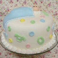 Sleeping Baby - Side This baby shower cake was my first ever. It was a baby shower cake for my friends shower. It was 2 - 8" layers. It was filled &...