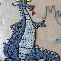 Dragon & Castle Birthday Cake Chocolate cake, chocolate filling, vanilla b/c frosting. Dragon made with rice paper technique, castle towers made from RKT.