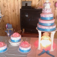 Pink And Blue Quinceanera Cake 3 single cakes, carrot, butter, and redvelvet, and 3 tier cake, chocolate, marble, and vanilla. Covered in fondant. the letters and gems...