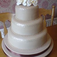 Wedding Cake With Edible Sequins This was my first wedding cake which I made for my friends in July. I made sugar Orchids for the top (first flowers I made) and edible...